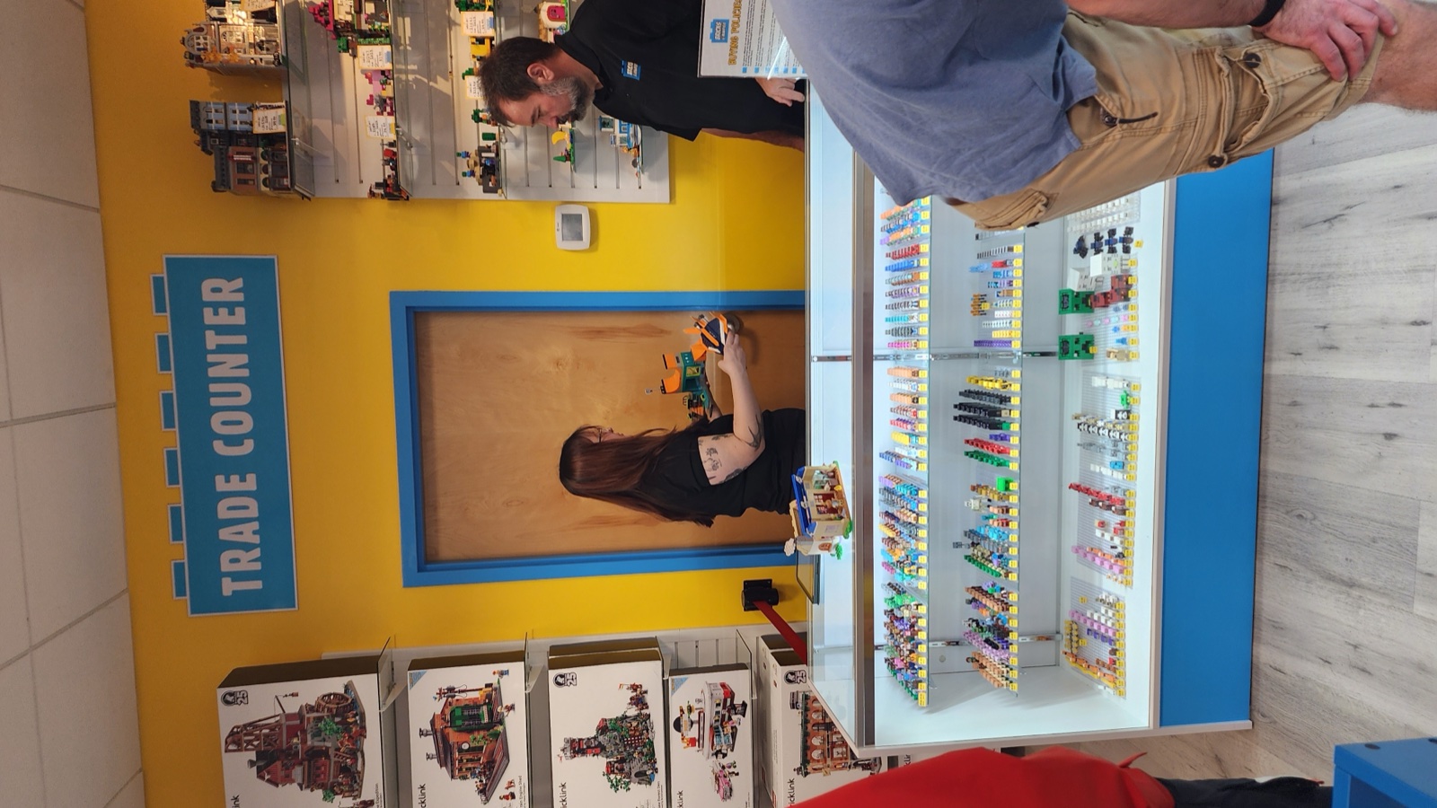 The Trade Counter and Build-a-Minifig wall at Bricks and Minifigs