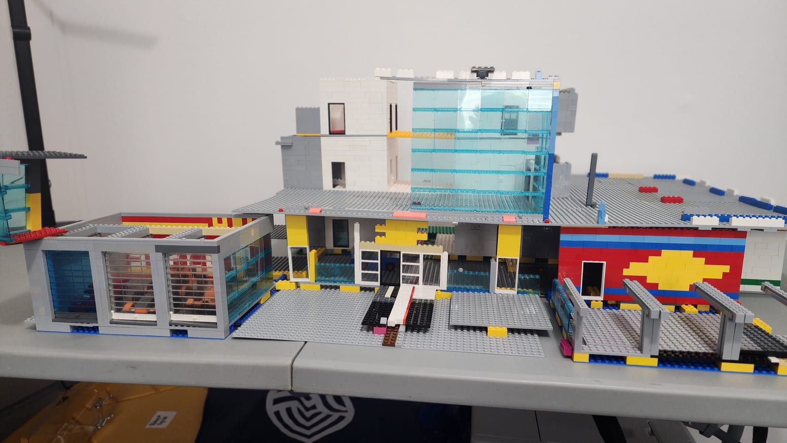 Full view of the IMS Pagoda LEGO build showing the beginnings of the level 2 broadcast area with slanted glass on the left side